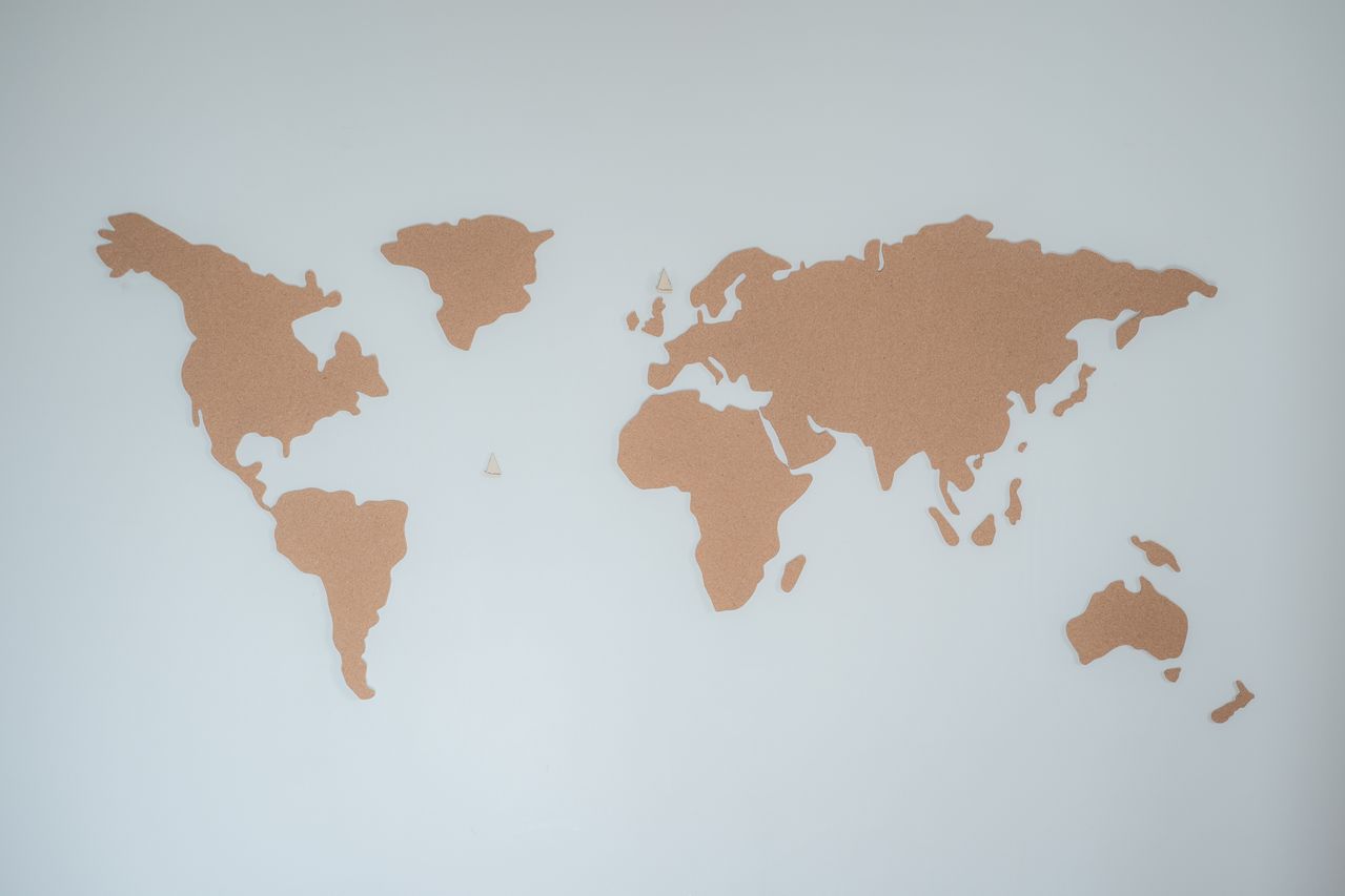 A world map on a wall.